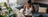 women sitting on the couch on her laptop sitting from a mug
